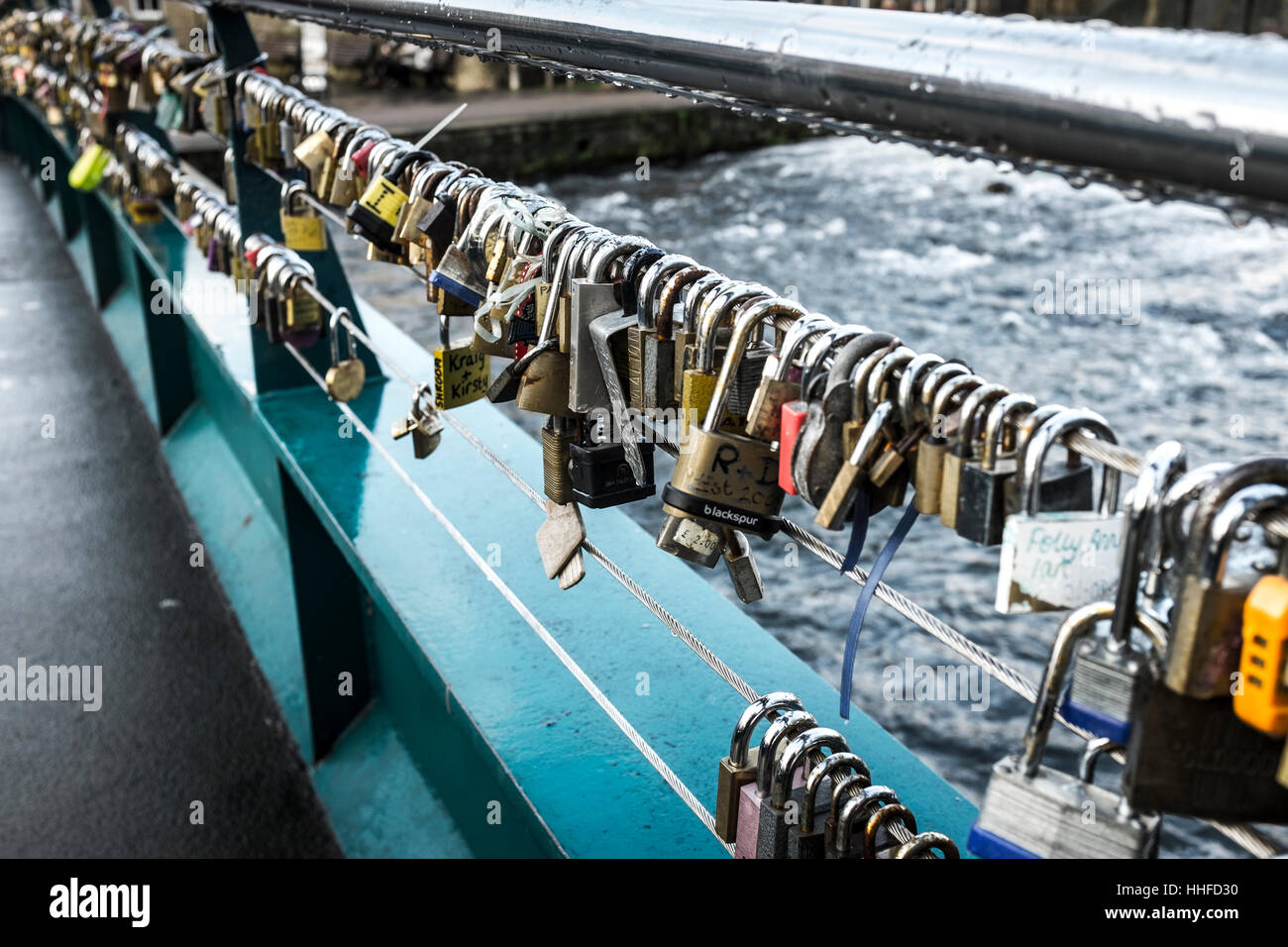 Padlocks attached to the cabling of the Weir Bridge over the River Wye