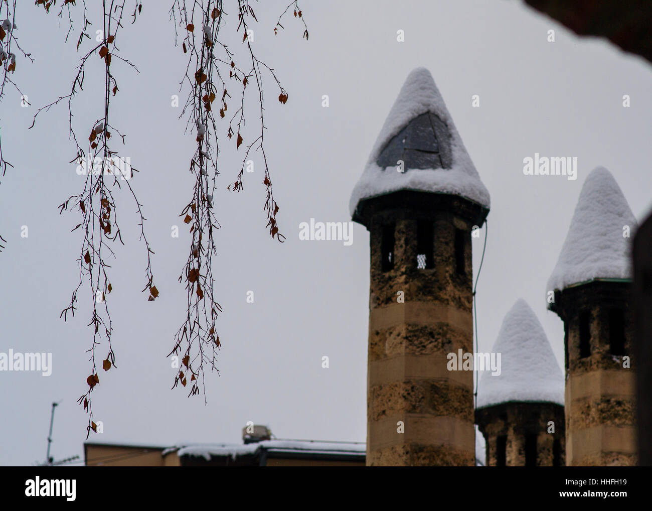 Chimney covered in snow Stock Photo