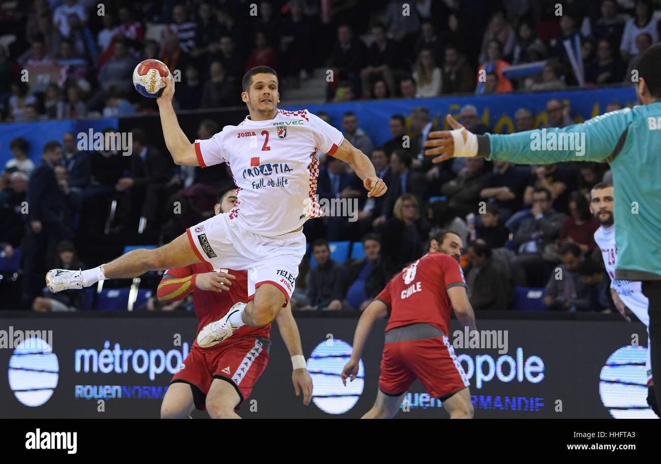 Croatia's Lovro Mihic (FRONT L) and Chile's Victor Donoso (HIDDEN), Pablo Baeza (C) and goalkeeper Felipe Barrientos vie for the ball during the men's Handball World Cup match between Croatia and Chile in Rouen, France, 18 January 2017. Photo: Marijan Murat/dpa Stock Photo