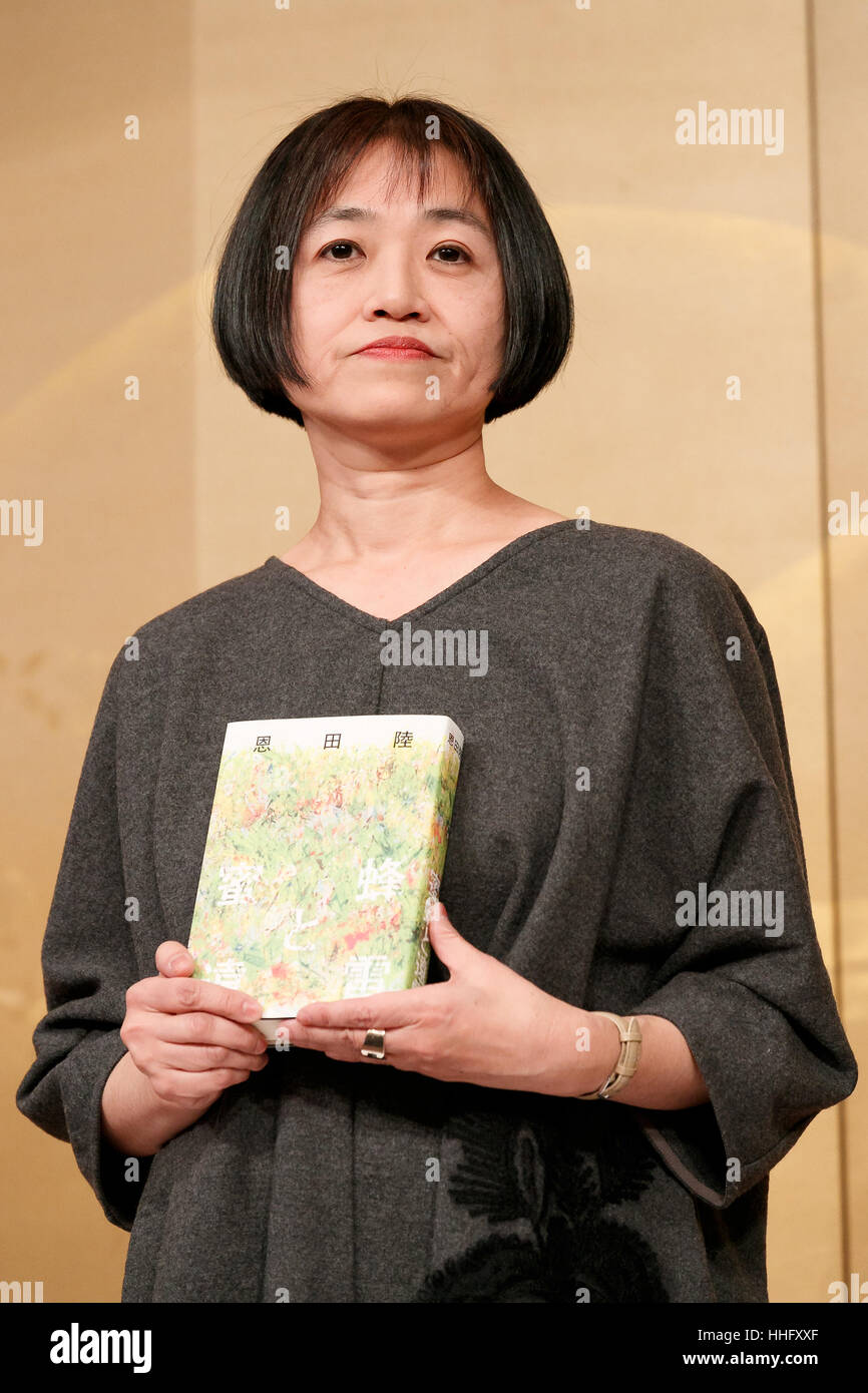 The 156th Naoki Prize winner Riku Onda, poses for cameras during the