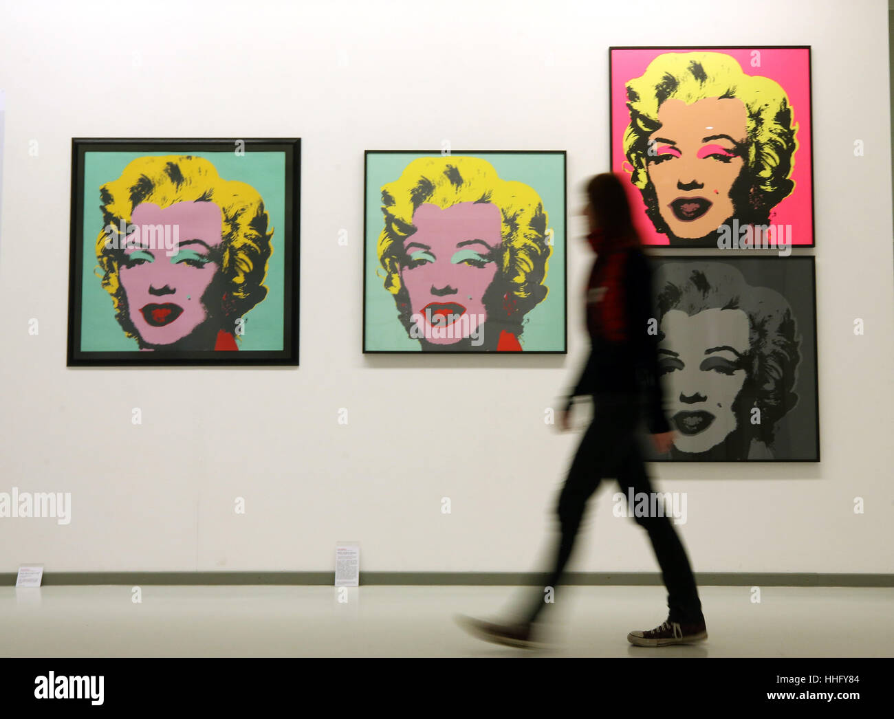 Oberhausen, Germany. 19th Jan, 2017. The original print 'Marilyn Monroe' (GREEN) by Andy Warhol (L) hangs next to an approved copy and misprints in the Ludwiggalerie Schloss Oberhausen in Oberhausen, Germany, 19 January 2017. The exhibition 'Let's Buy It' is showing around 300 pieces from Albrecht Duerer to Andy Warhol and Gerhard Richter on the topic of art and purchasing from 22 January to 14 May 2017. Photo: Roland Weihrauch/dpa/Alamy Live News Stock Photo