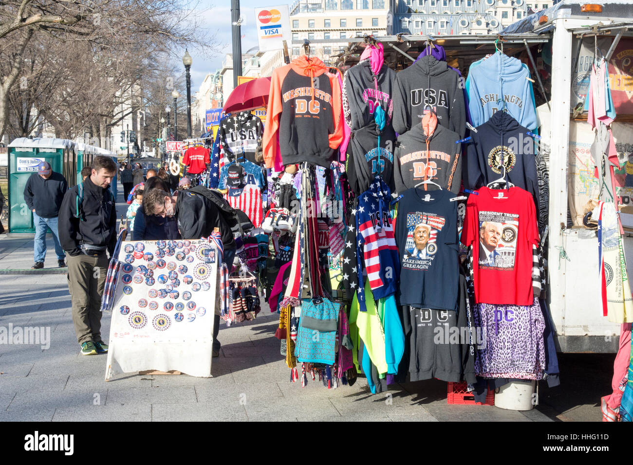 Washington DC, USA. 18th Jan, 2017. Near the White House in Washington, DC, street vendors sell buttons and clothing commemorating the inauguration of Donald Trump as 45th President. Credit: Tim Brown/Alamy Live News Stock Photo