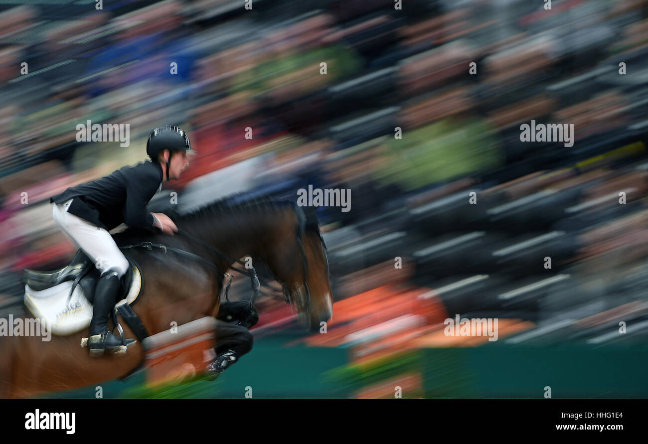 Leipzig, Germany. 19th Jan, 2017. German show jumper Marcus Ehning and horse Daytona du Toultia in action during the 'Kask Youngster Cup' of the 'Partner Pferd' (lit. 'Partner Horse') fair in Leipzig, Germany, 19 January 2017. The fair continues until Sunday, 22 January 2017. Highlight will be the finale in the Jumping World Cup. Photo: Hendrik Schmidt/dpa-Zentralbild/dpa/Alamy Live News Stock Photo