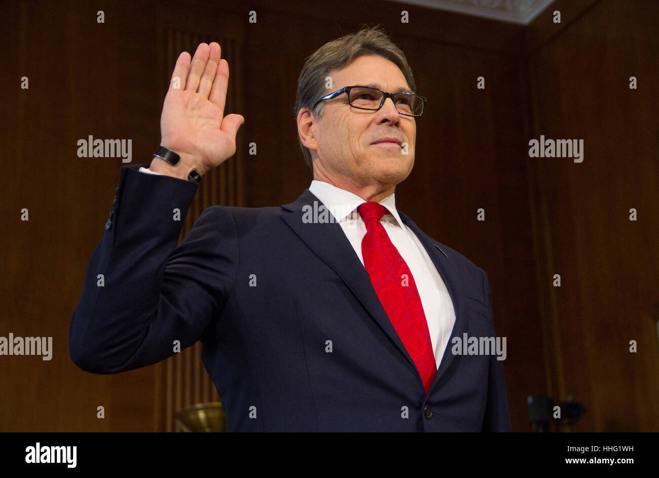 Washington, USA. 19th Jan, 2017. Former Texas Governor Rick Perry, President-elect Donald Trump's choice as Secretary of Energy, is sworn in at his confirmation hearing before the Senate Committee on Energy and Natural Resources on Capitol Hill January 19, 2017 in Washington, DC. Perry is expected to face questions about his connections to the oil and gas industry. Credit: PixelPro/Alamy Live News Stock Photo