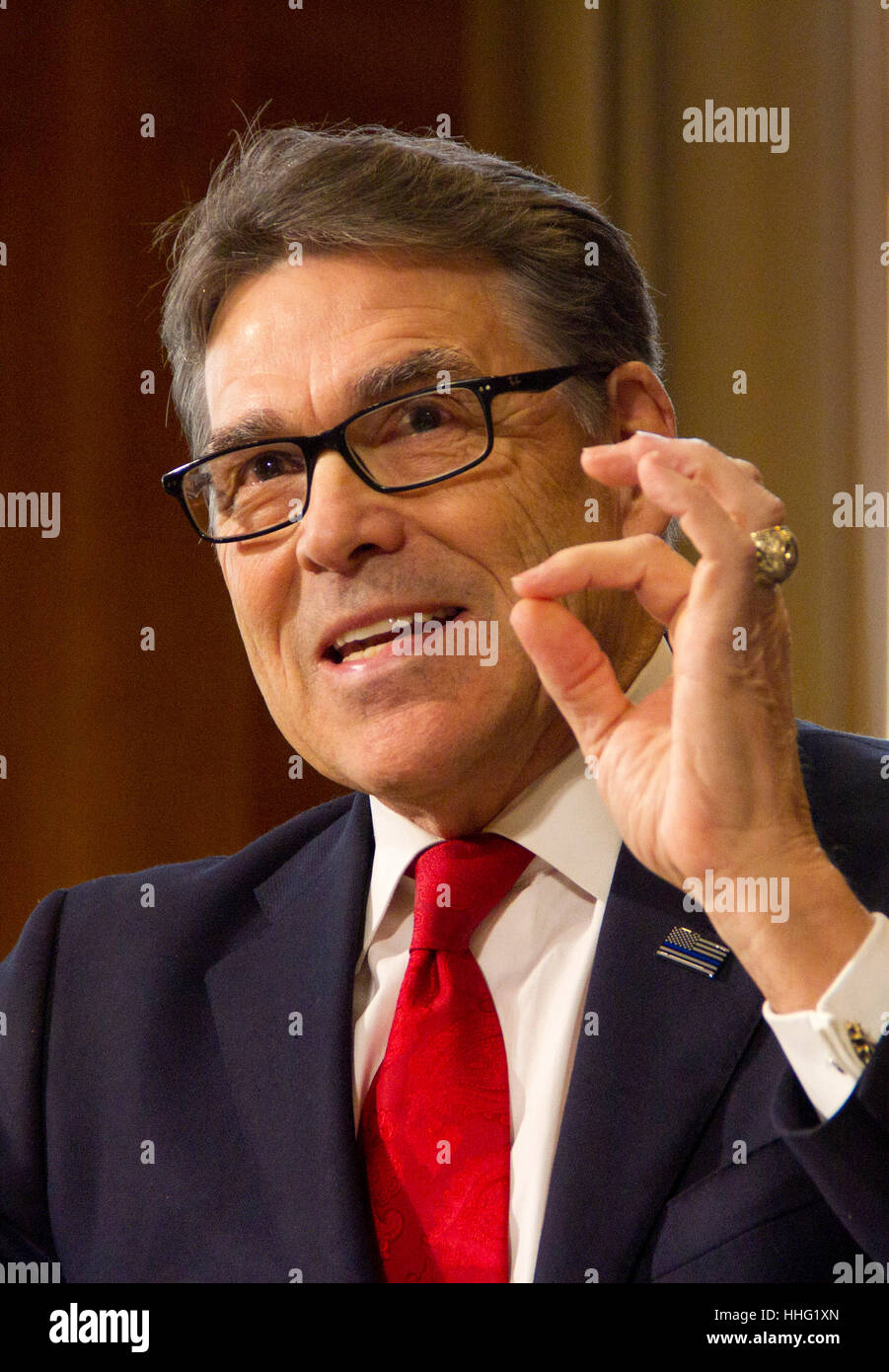 Washington, USA. 19th Jan, 2017. Former Texas Governor Rick Perry, President-elect Donald Trump's choice as Secretary of Energy, testifies during his confirmation hearing before the Senate Committee on Energy and Natural Resources on Capitol Hill January 19, 2017 in Washington, DC. Perry is expected to face questions about his connections to the oil and gas industry. Credit: PixelPro/Alamy Live News Stock Photo