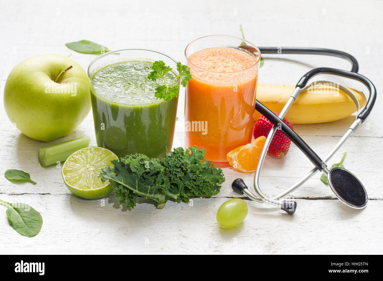 Fruits, vegetables, juice, smoothie and dumbbell health diet and fitness lifestyle concept Stock Photo