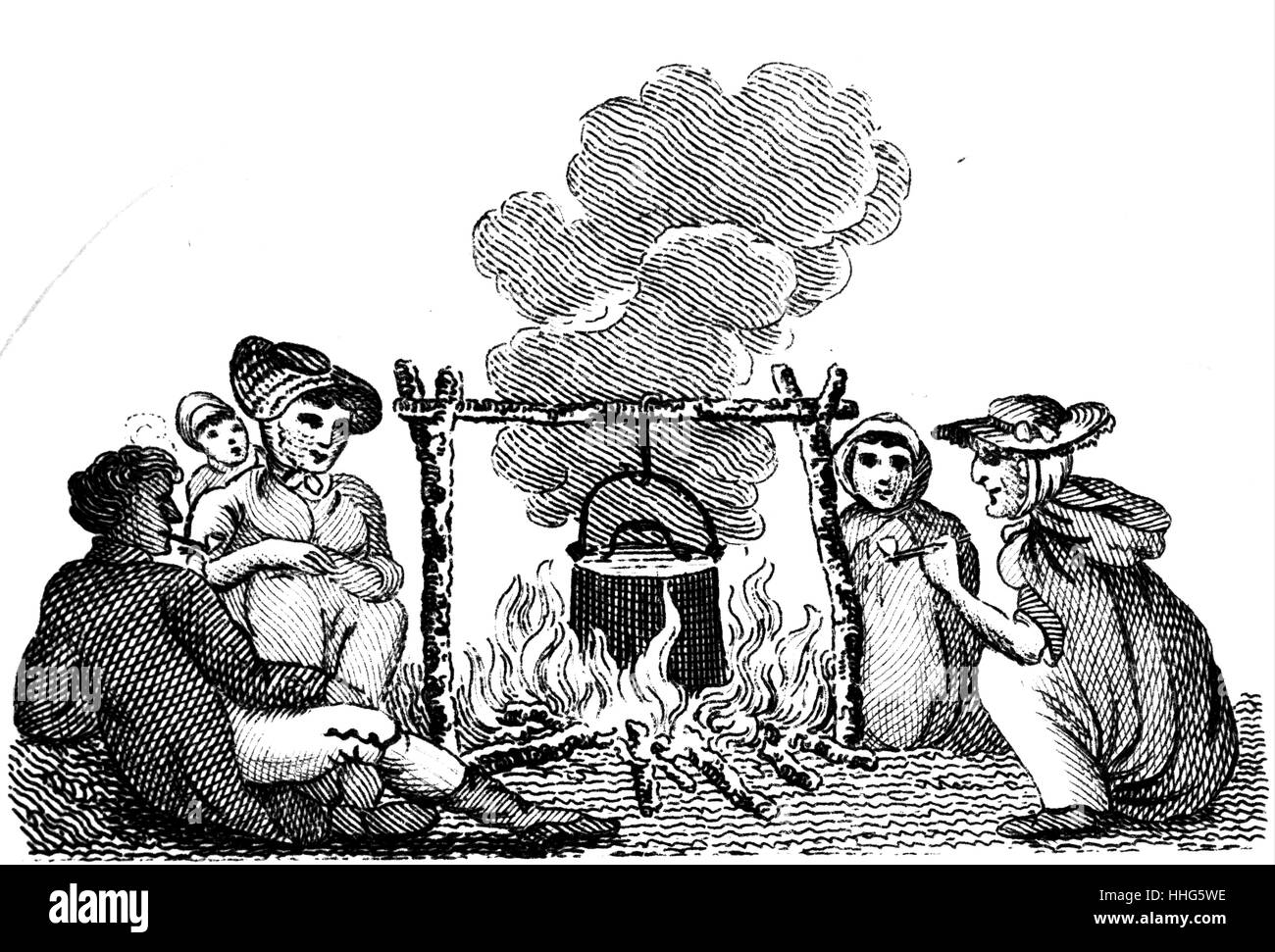 Gipsy family around their camp fire, 1825 Stock Photo