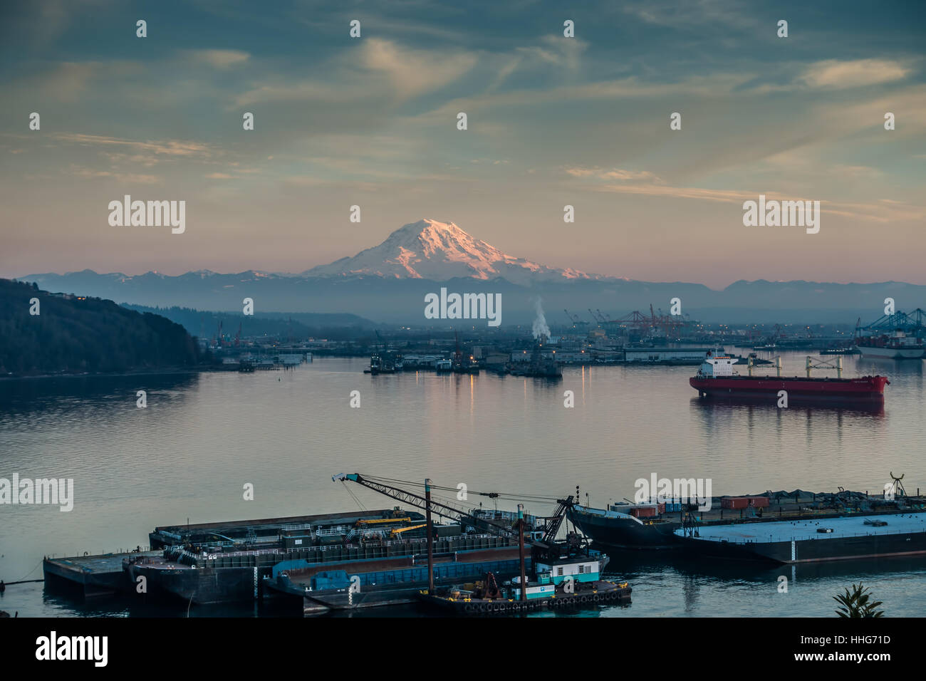 A view of the Port of Tacoma and Mount Rainier at sunset Stock Photo ...
