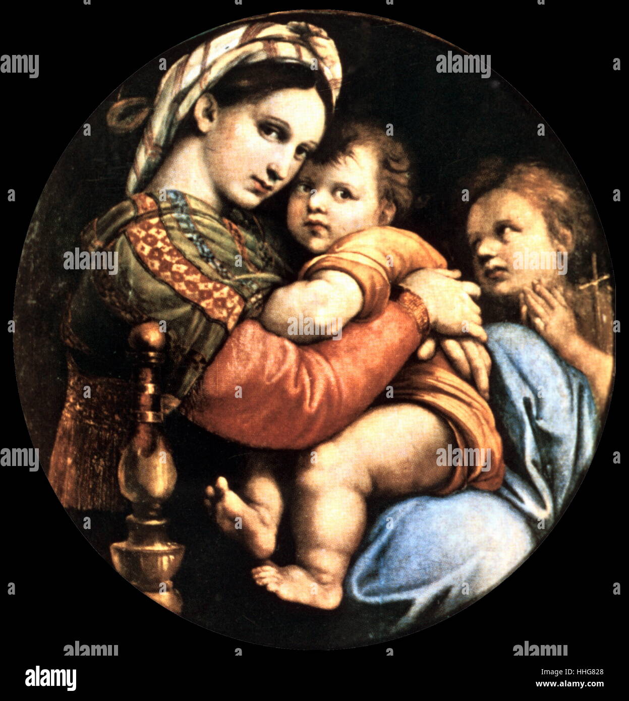 Madonna della seggiola or Madonna della sedia, by Raffaello Sanzio da Urbino (1483-1520). Oil painting on panel, finished in 1513–1514. Raphael was an Italian painter and architect of the High Renaissance. The Madonna della seggiola, in the Palazzo Pitti, in Florence, depicts Mary embracing the child Christ, while the young John the Baptist devoutly watches. Stock Photo