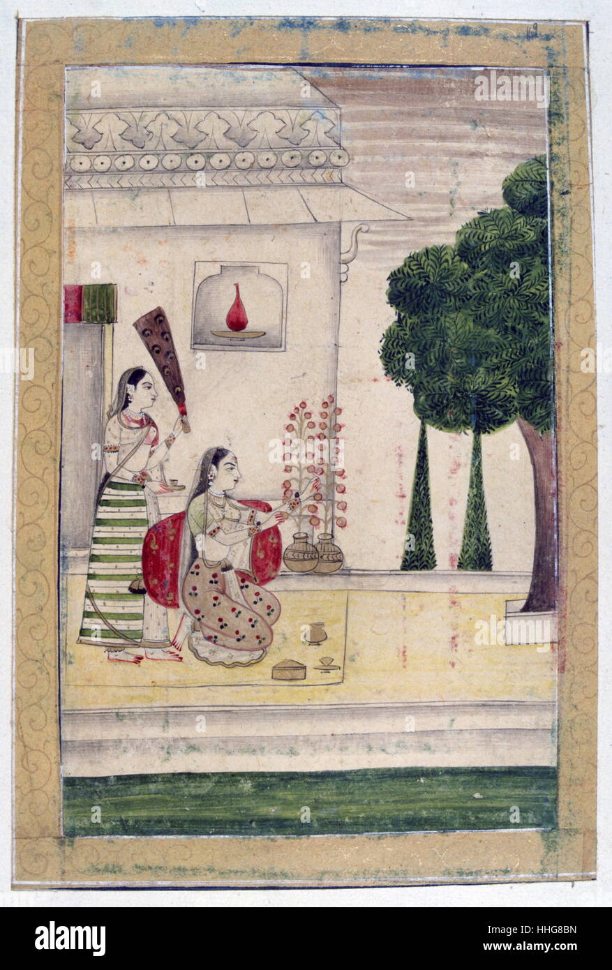 Indian Mughal miniature depicting a young woman arranging flowers, symbolising love re-united, in front of a pavilion. Rajasthan school; Album of Ragamala 19th century Stock Photo