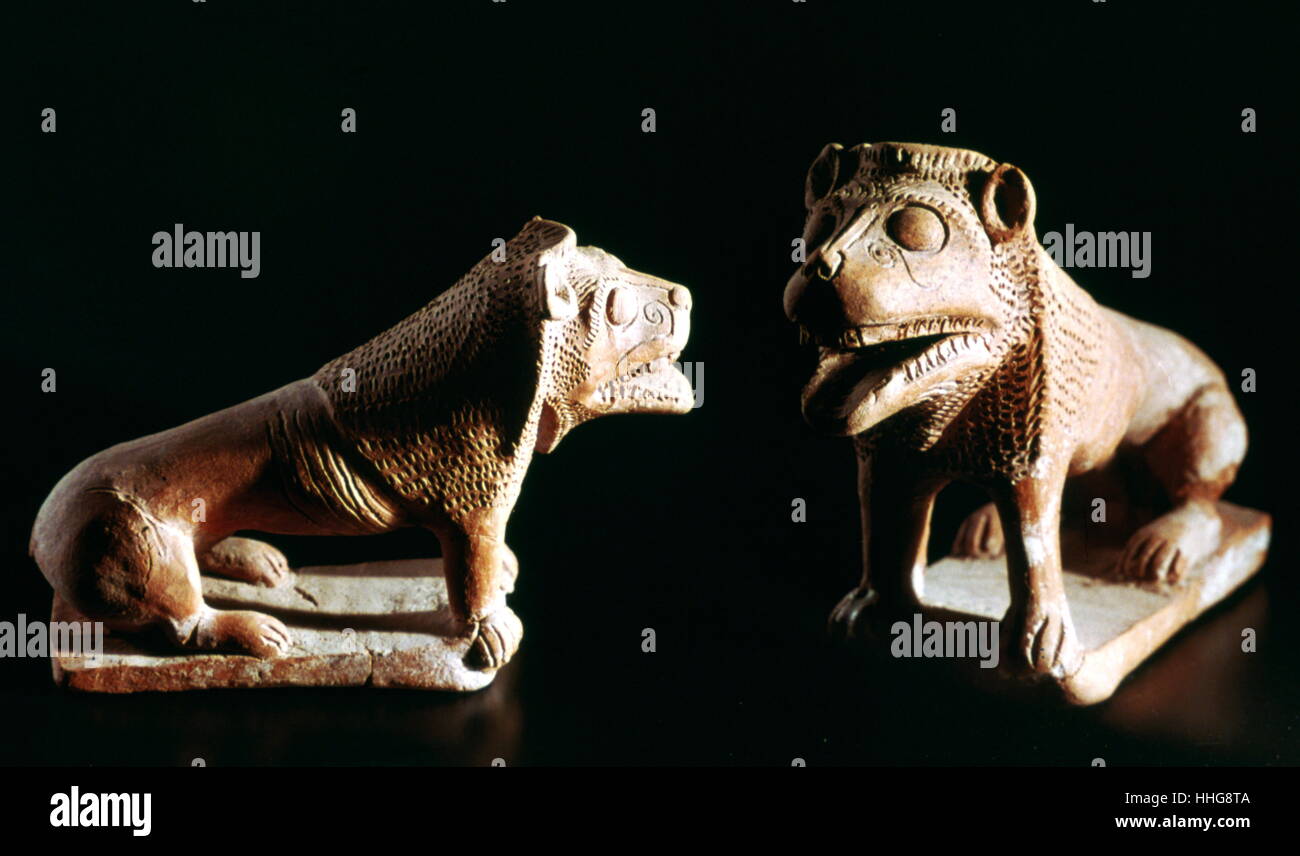 Two lion figures in fired clay, from the Punic city of Kerkouane, in the north-eastern region of Tunisia. Once a thriving Phoenician metropolis, Kerkouane became a ghost town when its inhabitants abandoned it while battling the invading Roman Empire. This Phoenician city was probably abandoned during the First Punic War (c. 250 BC) and, as a result, was not rebuilt by the Romans. It had existed for almost 400 years. Stock Photo