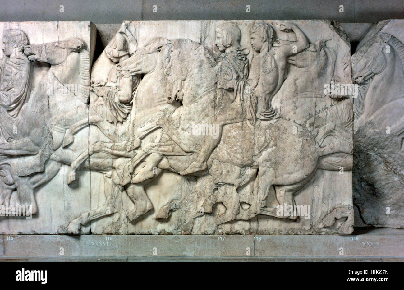 cavalry, depicted in the Parthenon frieze, a high-relief pentelic marble sculpture created to adorn the upper part of the Parthenon’s naos. It was sculpted between c. 443 and 438 BC, most likely under the direction of Phidias Stock Photo