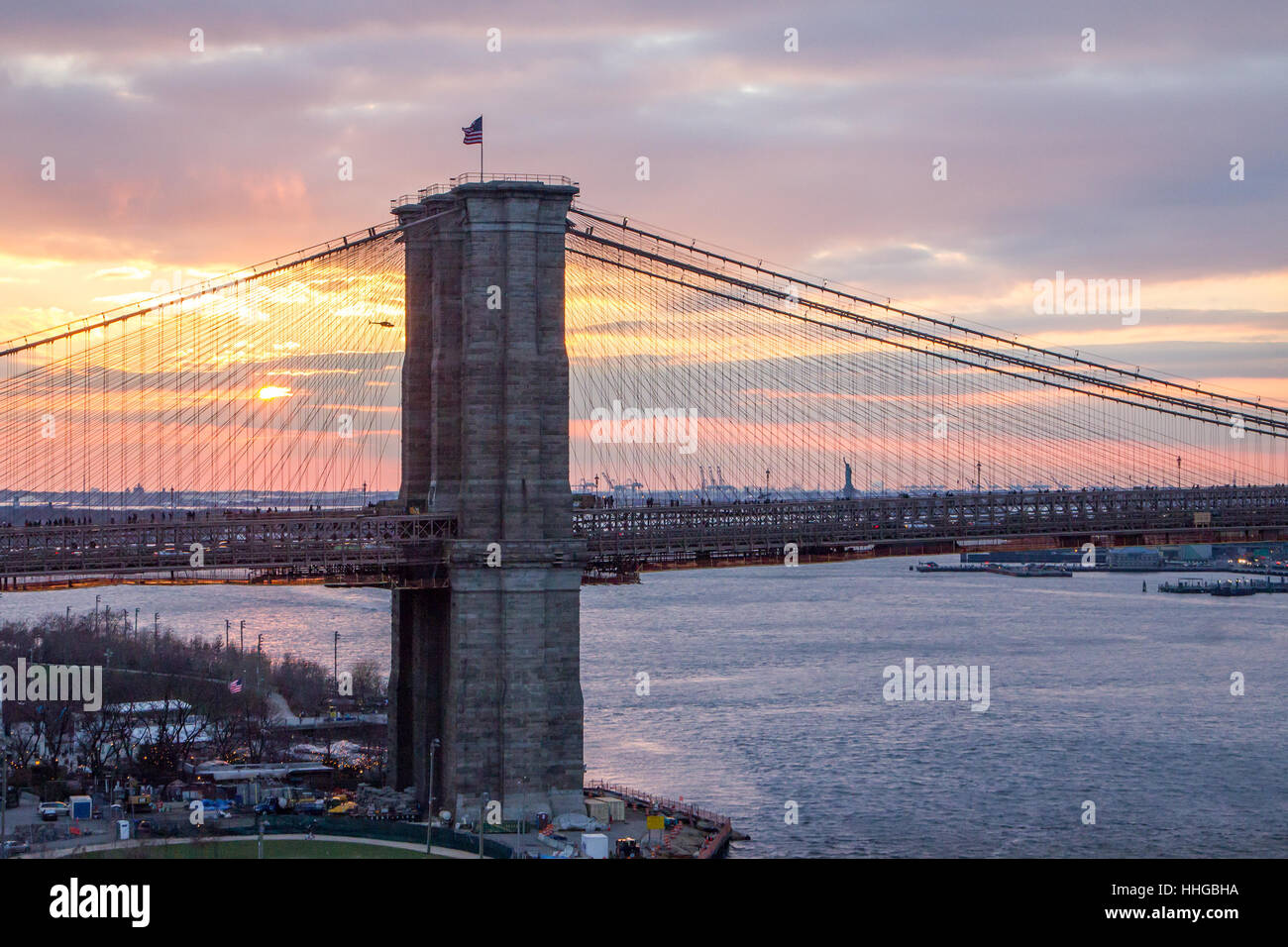 New York City colorful sunset landscape scene with the Brooklyn Bridge ...