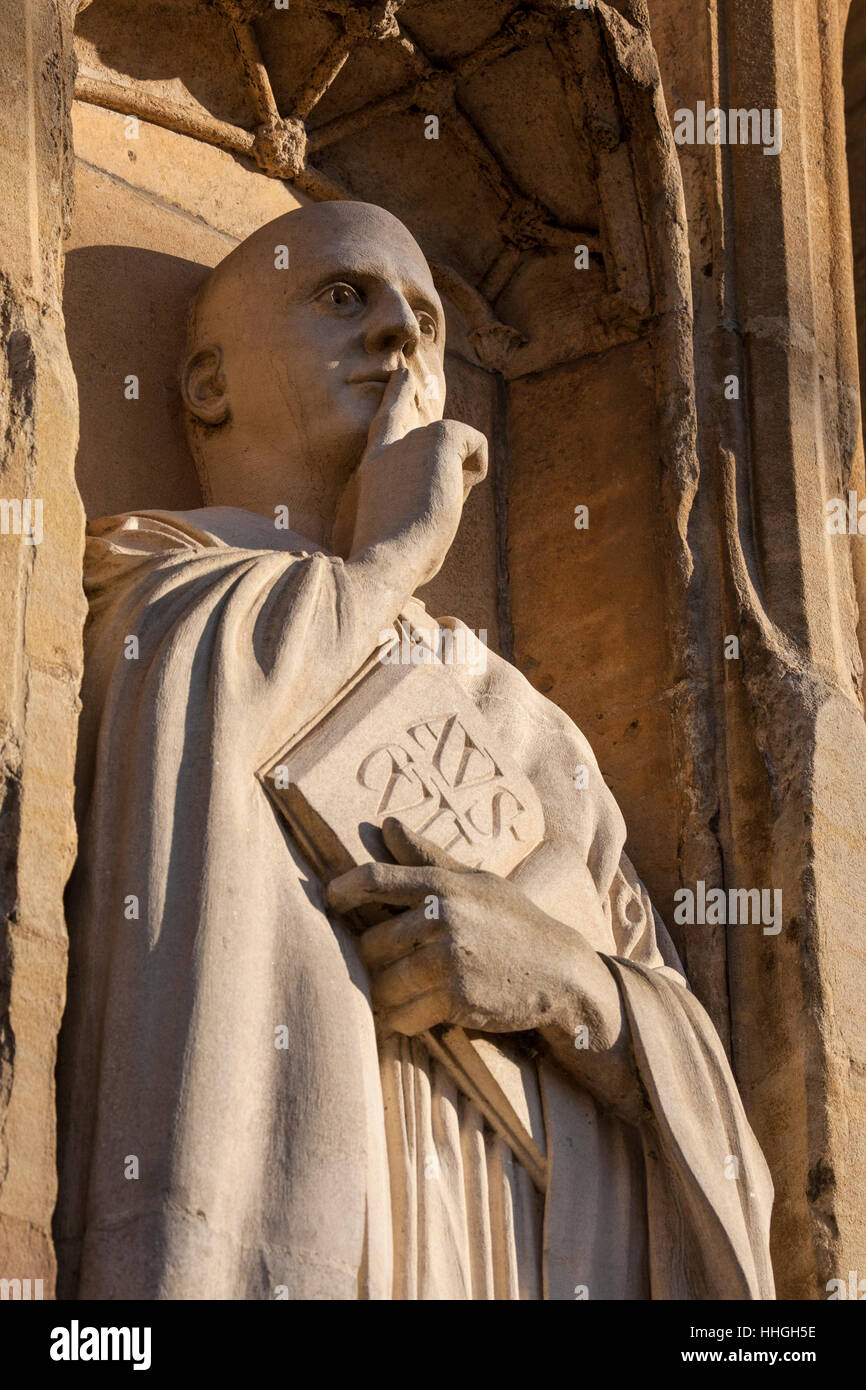 A sculpture of St. Benedict on the exterior of the West Porch of Norwich Cathedral in the