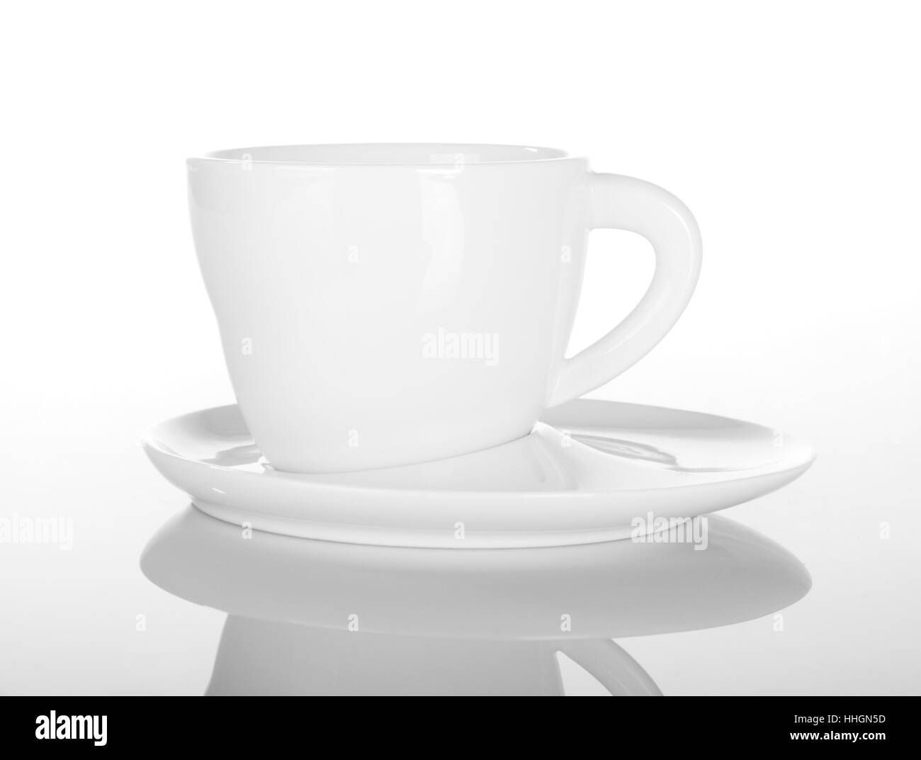Empty cup of tea on white with reflection Stock Photo Alamy