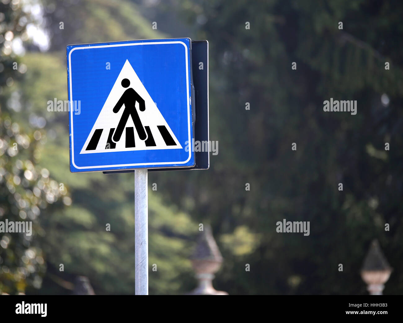 blue european road sign warning pedestrian crossing in the city Stock ...