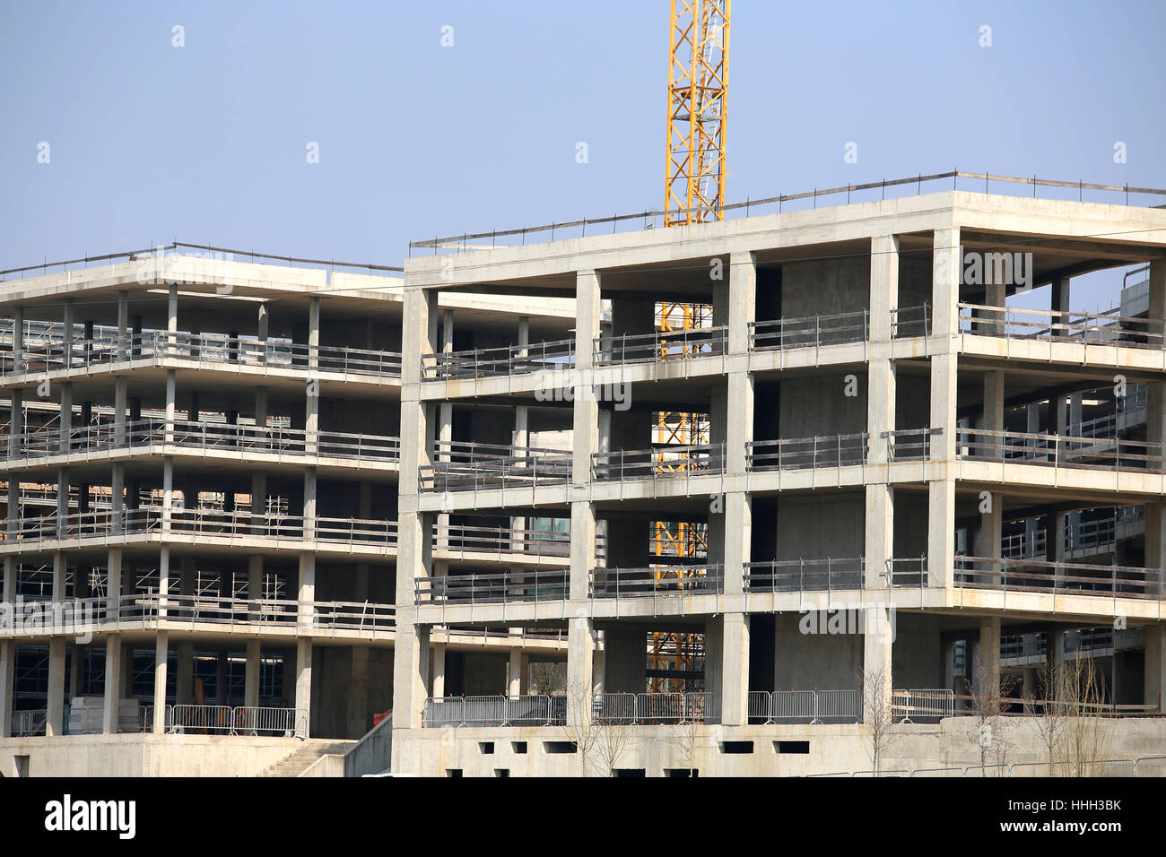 huge building under construction with reinforced concrete walls on the outskirts of the city Stock Photo