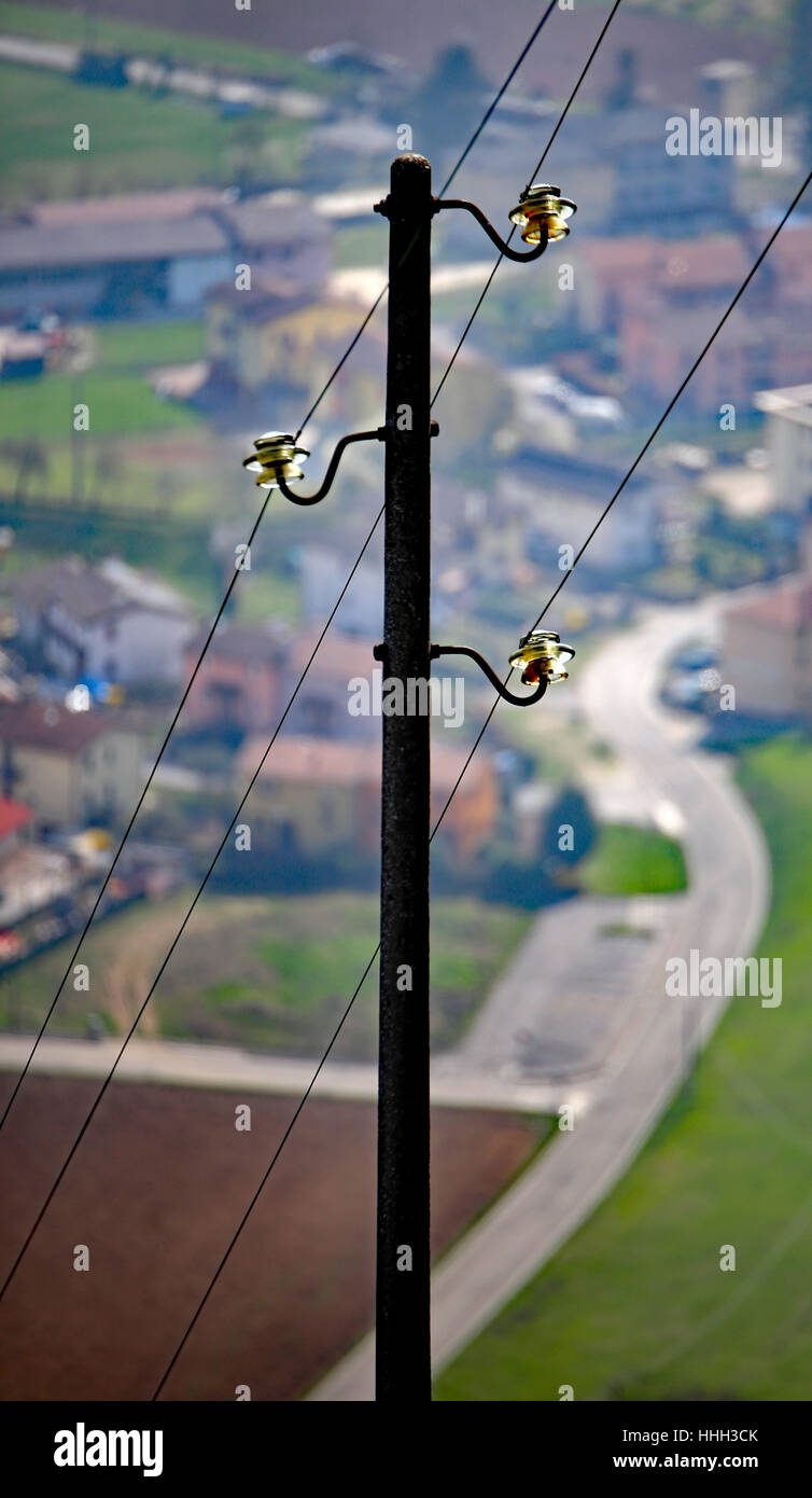 light pole with three wires of the power line to supply electricity to