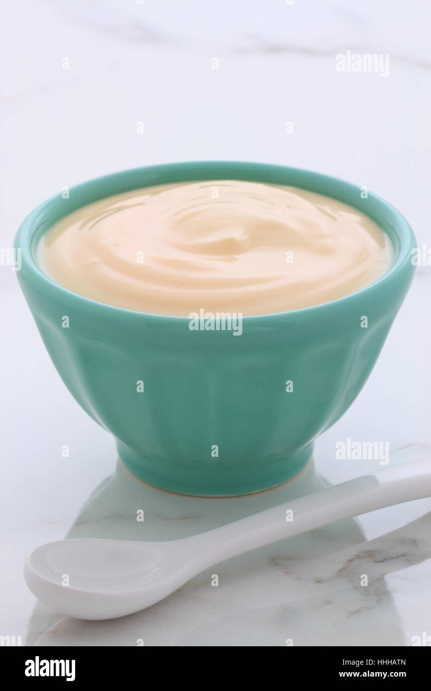 Delicious, nutritious and healthy fresh plain yogurt cup. On vintage