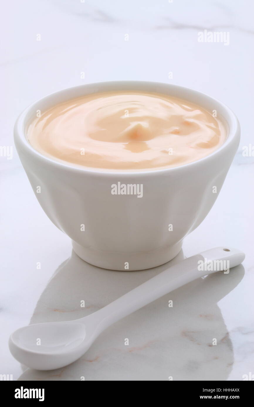 Delicious, nutritious and healthy fresh plain yogurt cup. On vintage