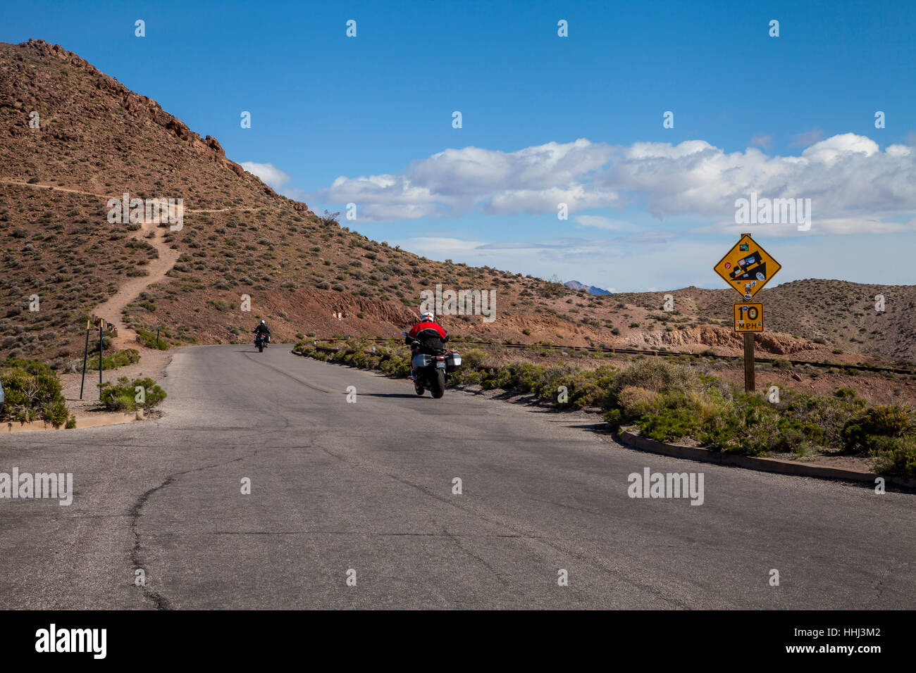 Motorcyclists leaving Dante's View, Death Valley National Park, California, USA Stock Photo