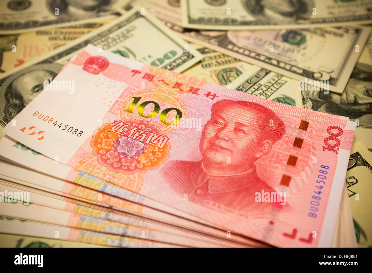 Chinese Yuan Note and U.S. dollar background  (Exchange rate concept) Stock Photo