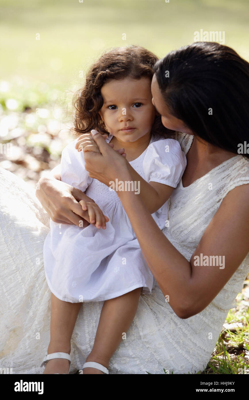 Mother holding daughter Stock Photo - Alamy