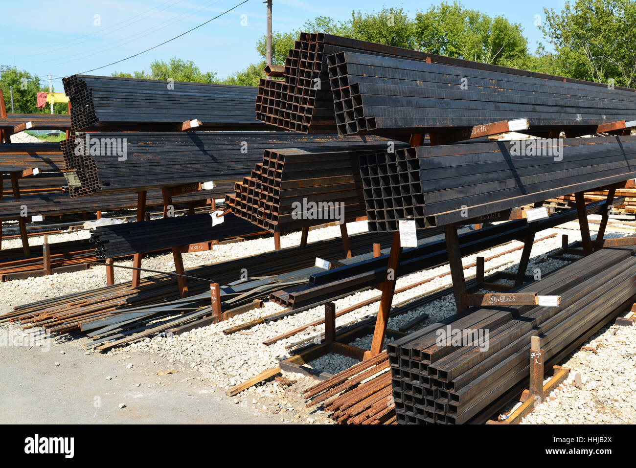 rust metal quadratic profile lies in heap Stock Photo - Alamy