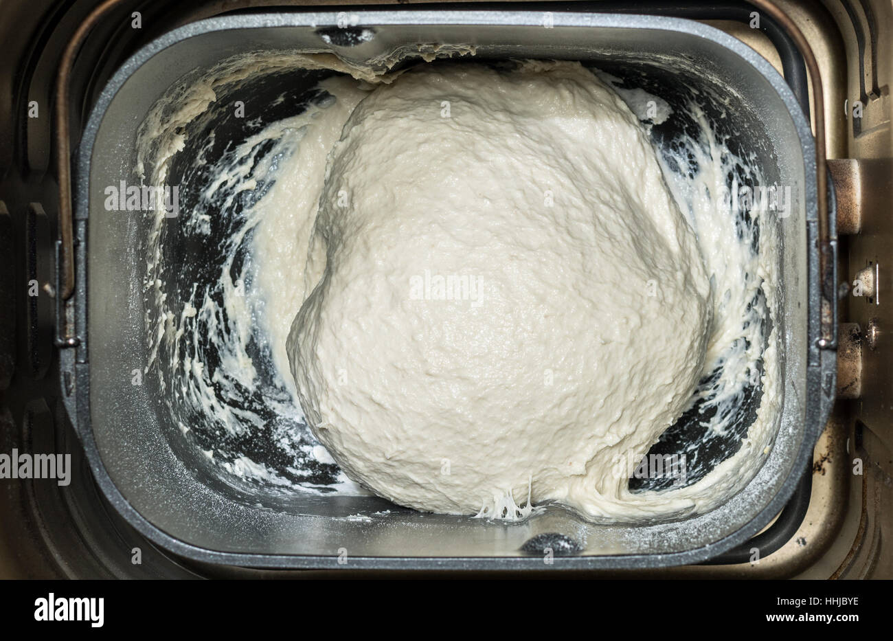 Prepare dough in bread maker Stock Photo Alamy