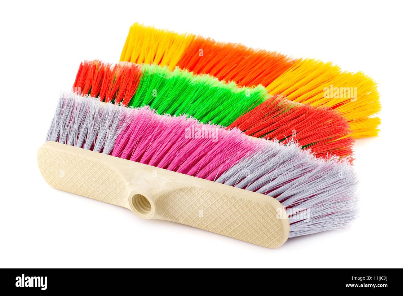 Colorful brooms isolated on white background Stock Photo - Alamy
