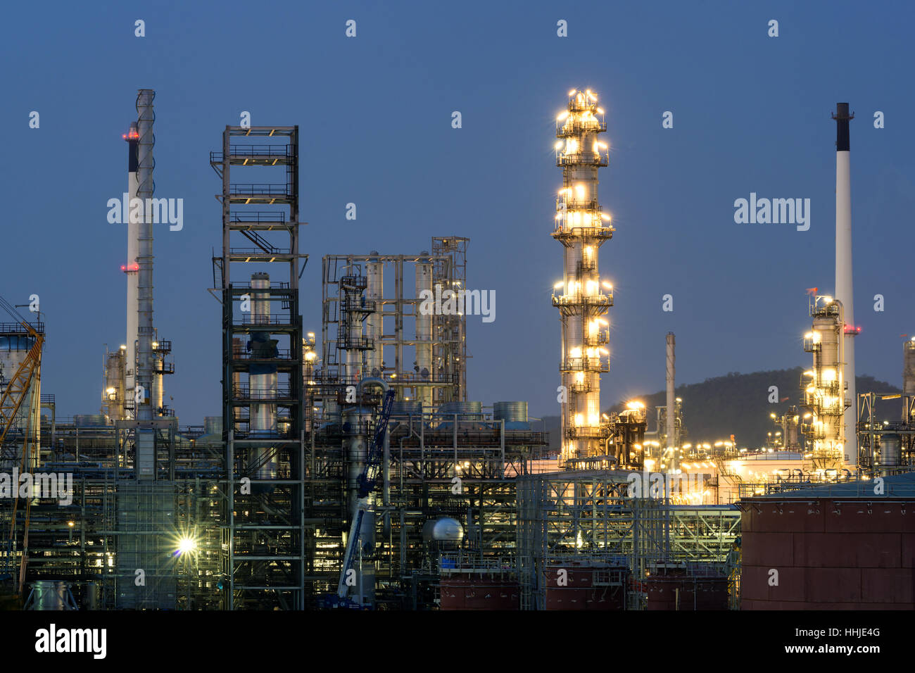 Oil refinery industry or petroleum industry with oil storage tank in Chonburi, Thailand. Stock Photo