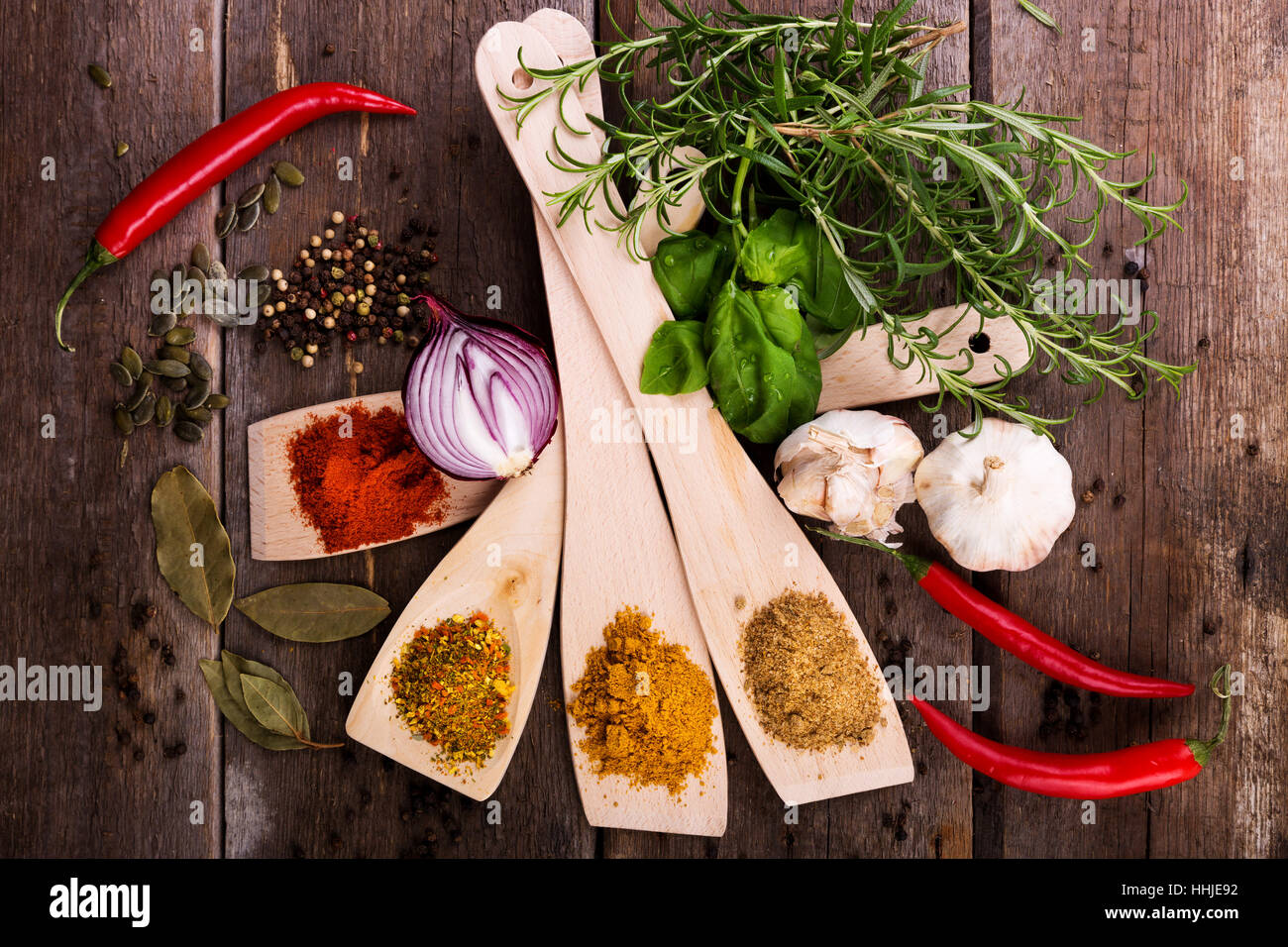 herbs and spices on old wooden background. top view Stock Photo