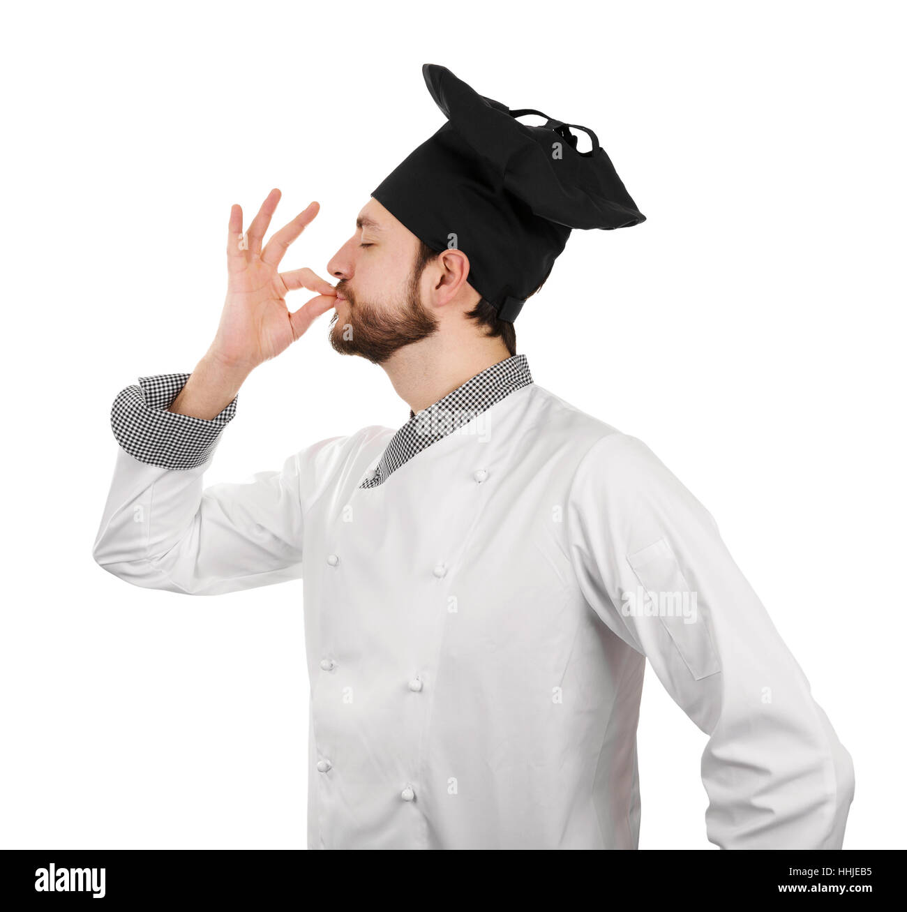 young male chef showing perfect taste sign Stock Photo