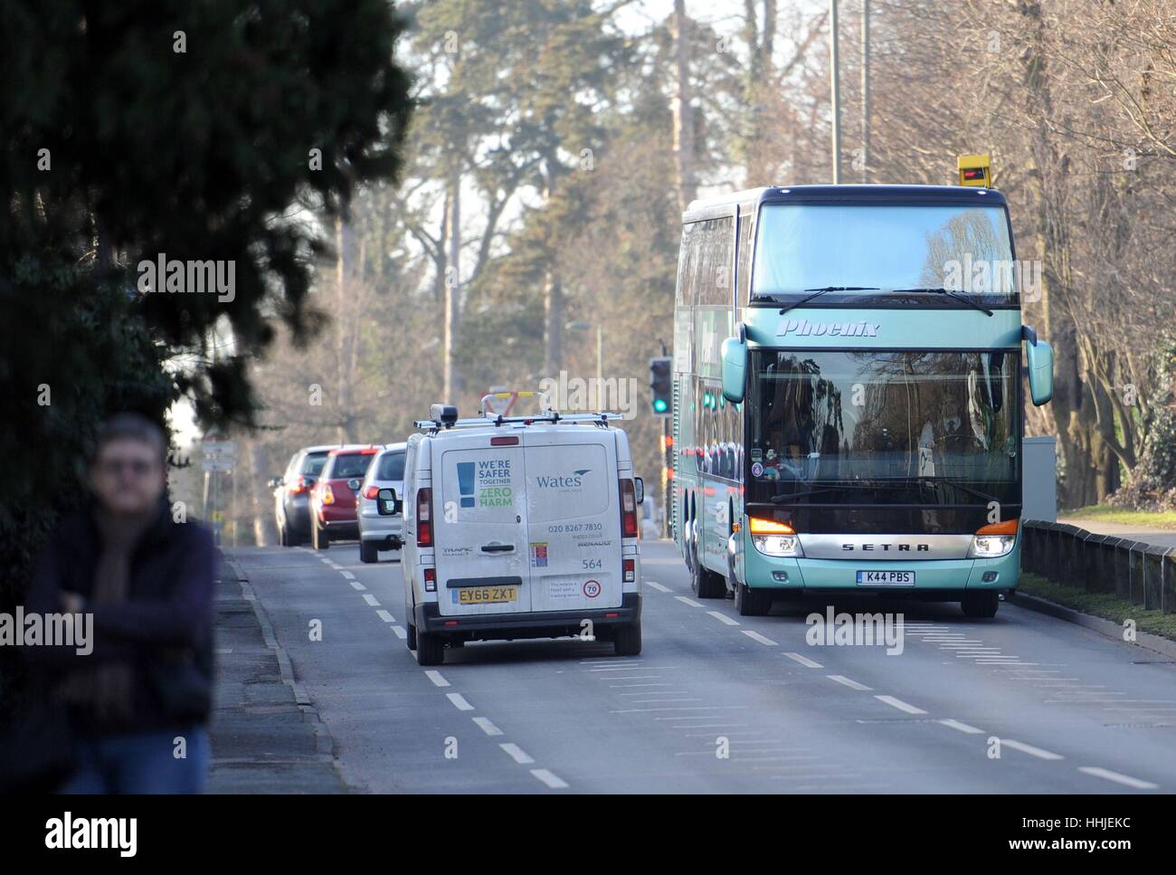Status Quo band members arrive in their tour bus at Woking Crematorium
