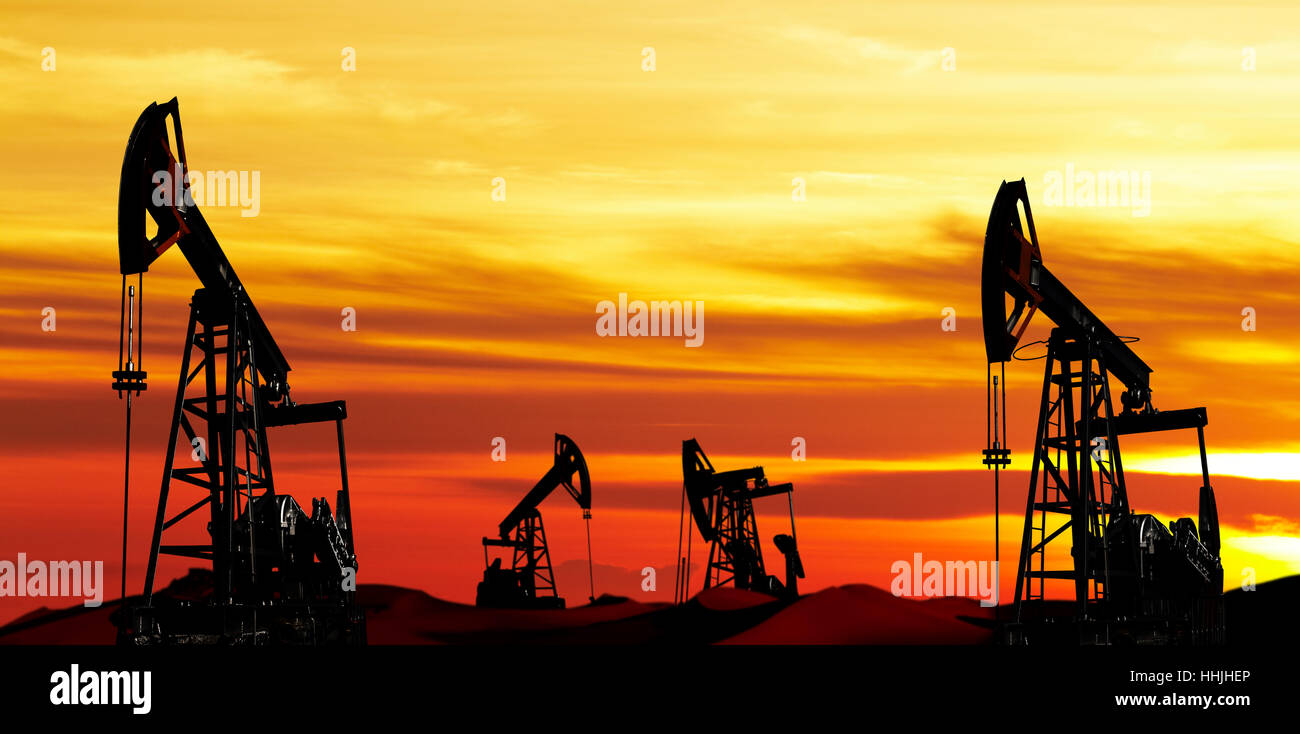 Oil pumps silhouette at colorful sunset Stock Photo