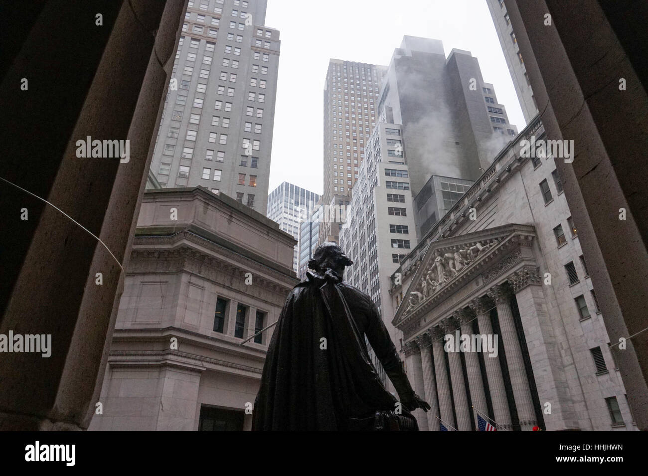 The statue of George Washington looking out from the steps of Federal ...