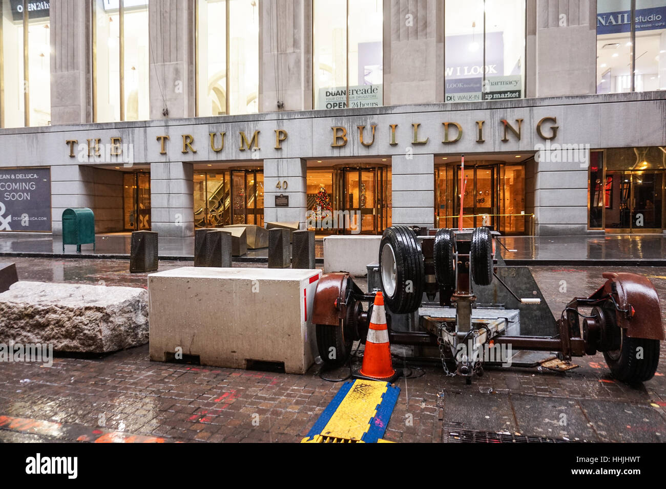Concrete blocks outside The Trump Building at 40 Wall Street, Manhattan, New York City, USA Stock Photo