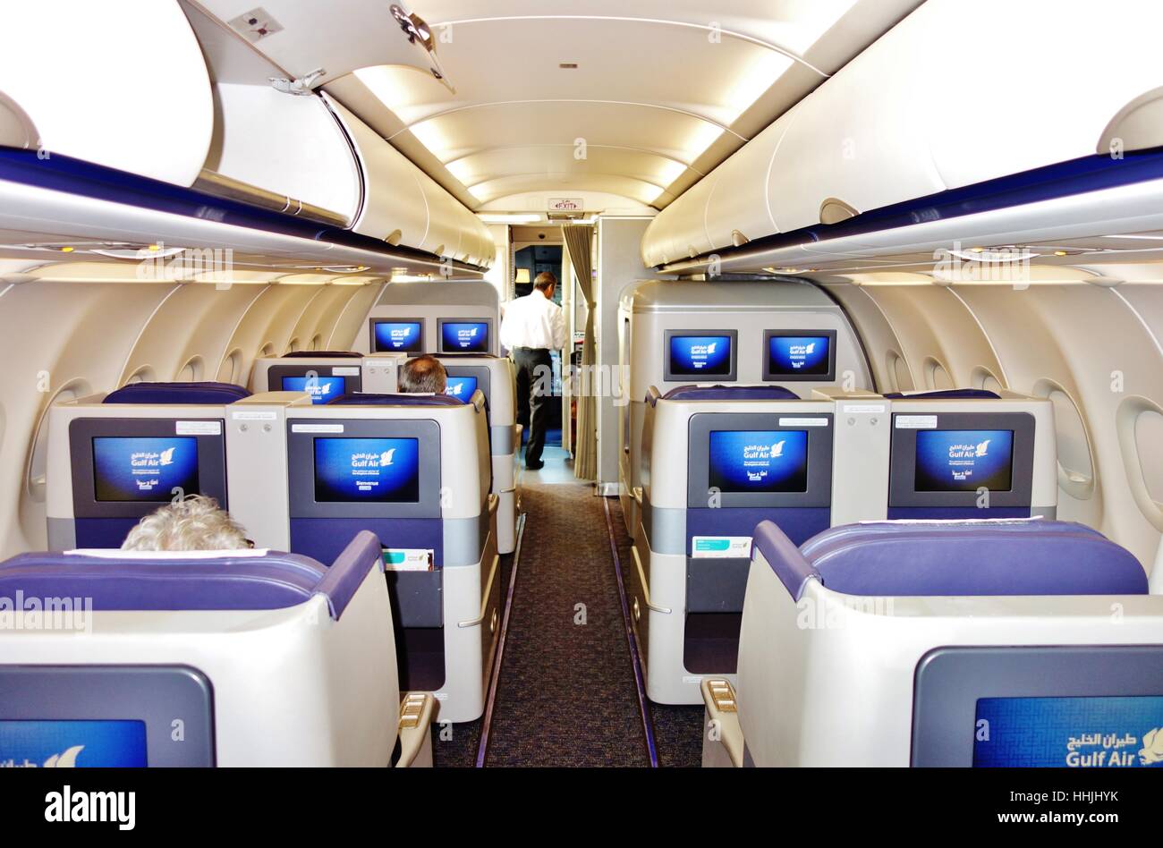 Premium seats inside the Business Class cabin of an airplane from Gulf Air (GF), the national carrier of Bahrain. Stock Photo