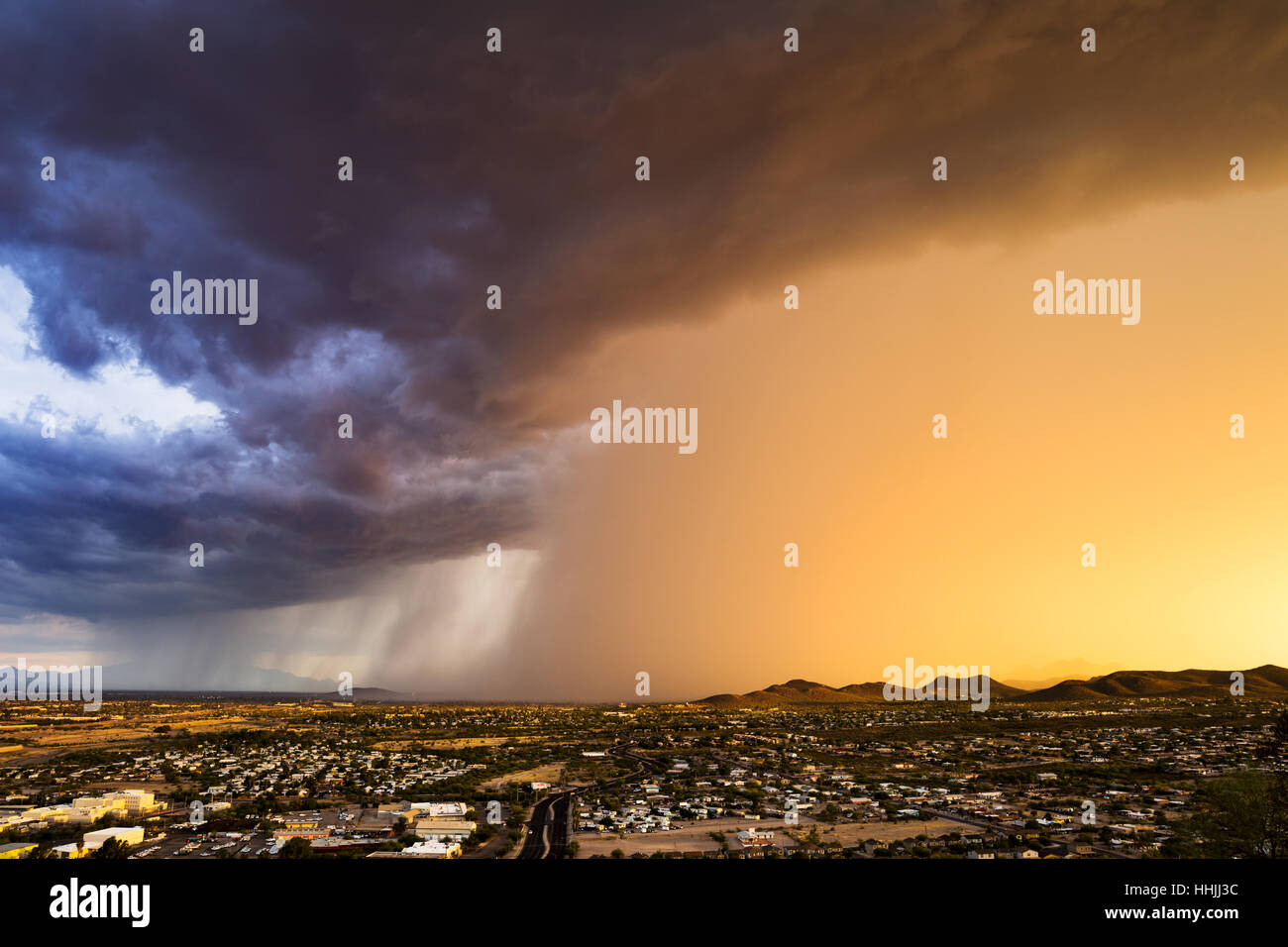Dramatic clouds and sky from a summer thunderstorm approaching Tucson, Arizona at sunset Stock Photo