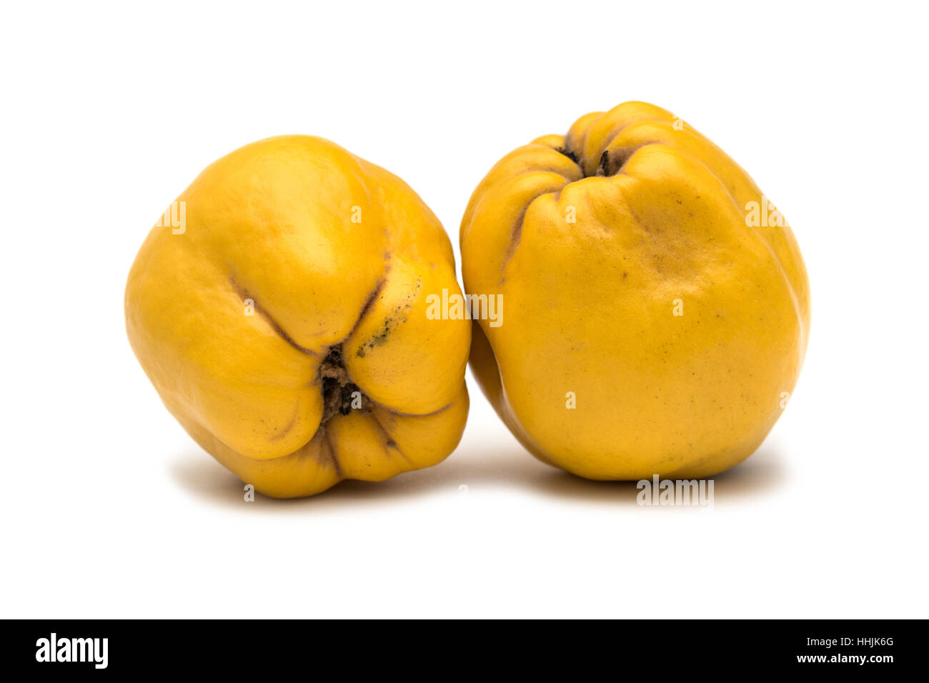 Quince on white background Stock Photo - Alamy
