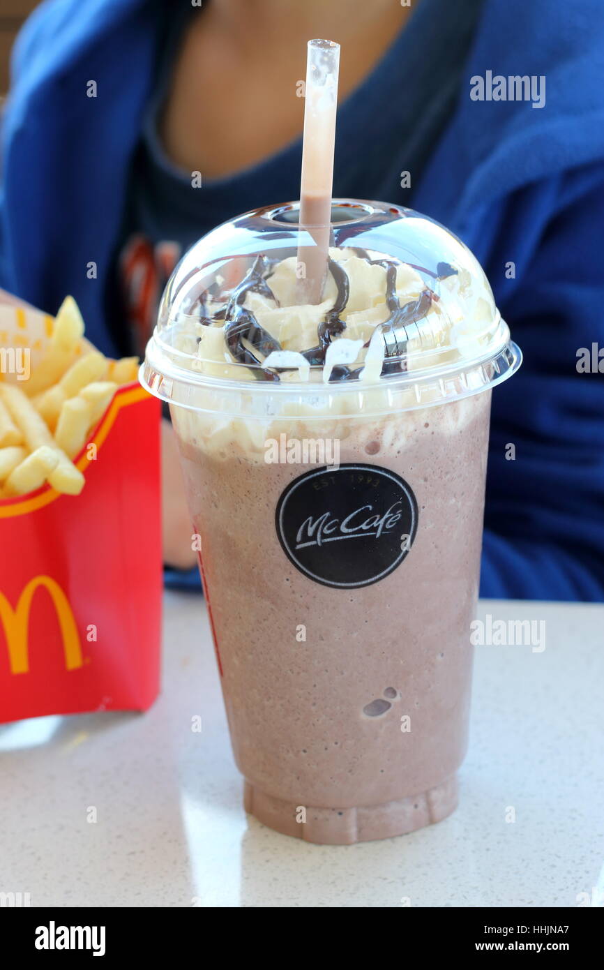 Close up of McDonald's chocolate Frappe and potato chips in McDonald's Melbourne Victoria Australia Stock Photo