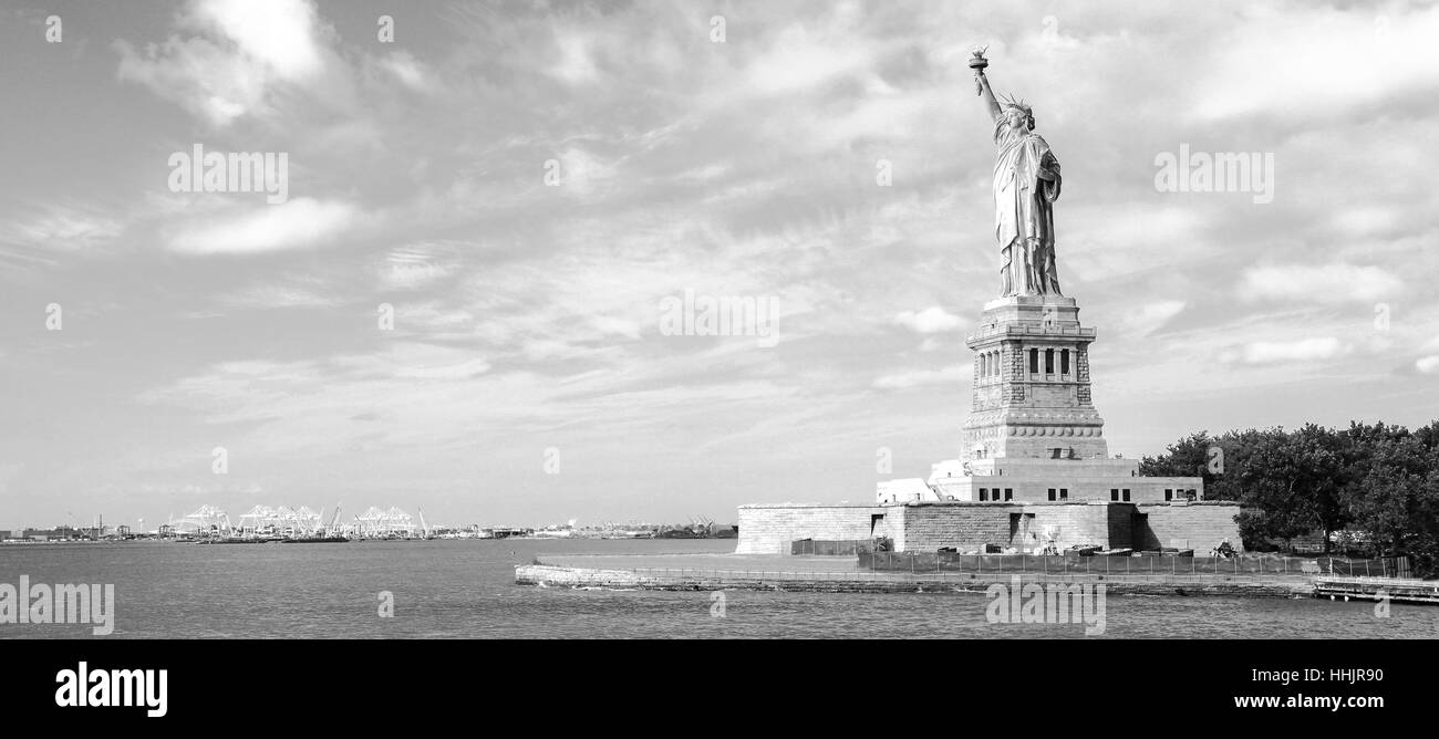 Panorama on the Statue of Liberty and the Skyline of Manhattan, New York City, United States Stock Photo