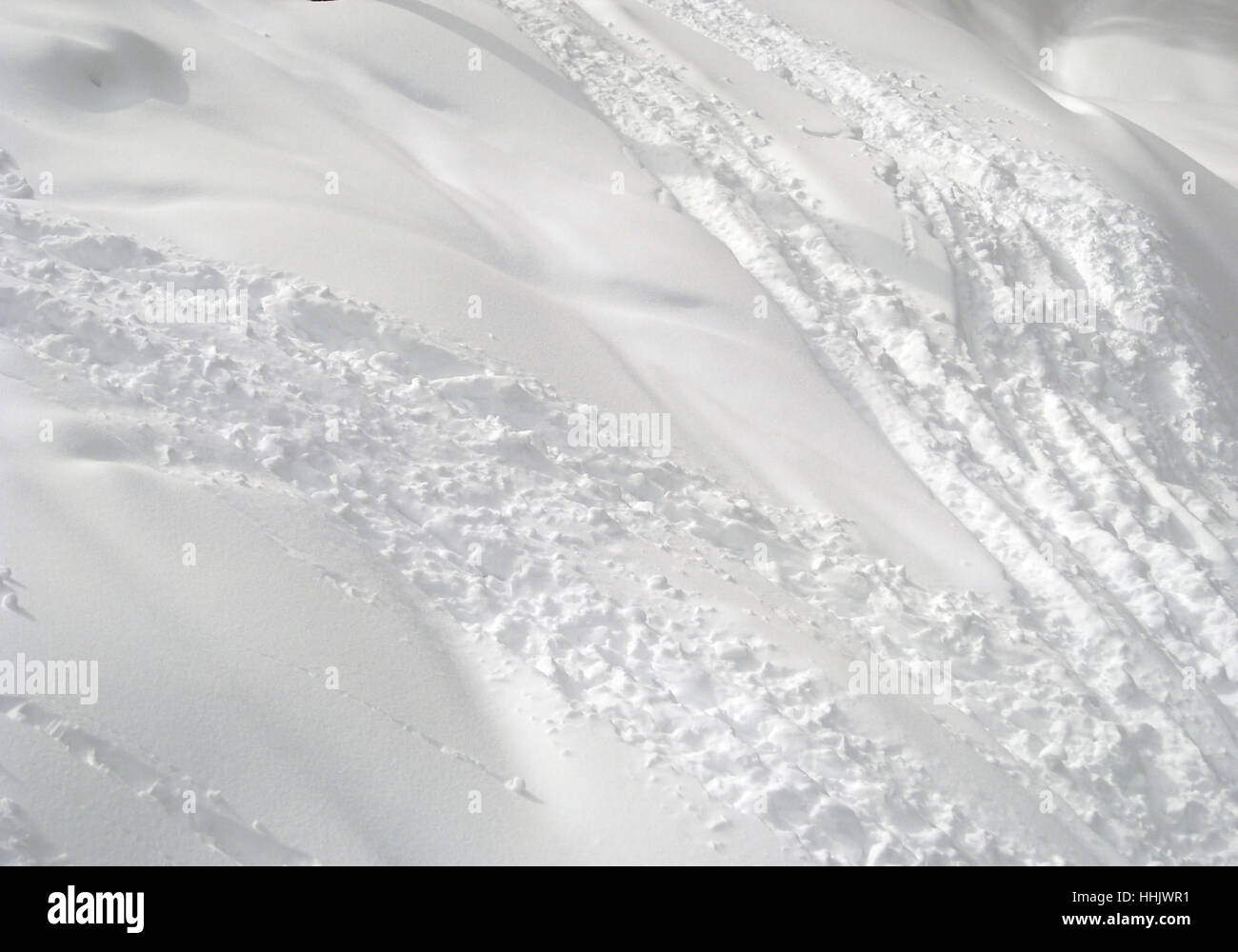 abstract snow background with ski traces in sunny ambiance Stock Photo ...