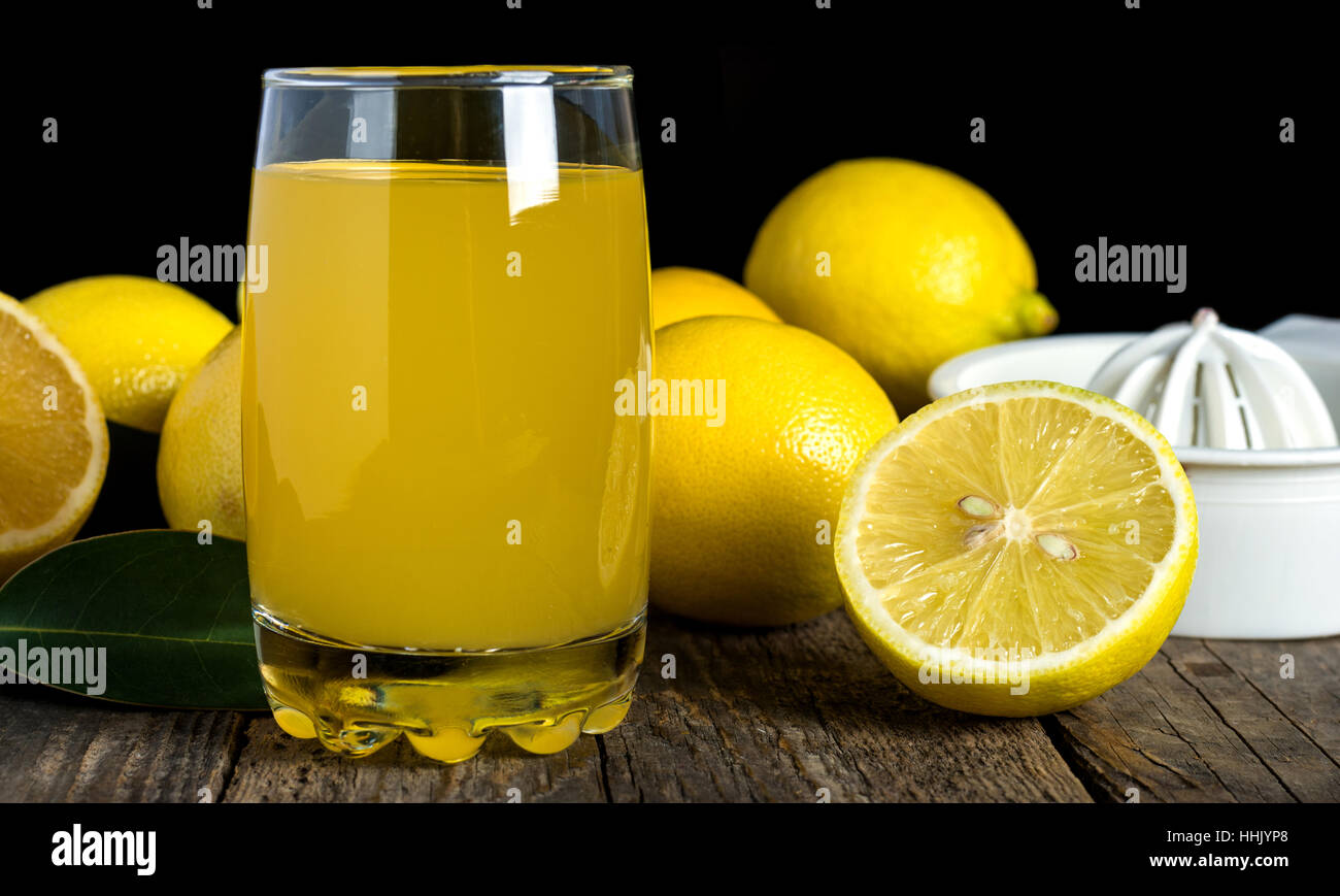 Squeezing lemon juice Stock Photo Alamy
