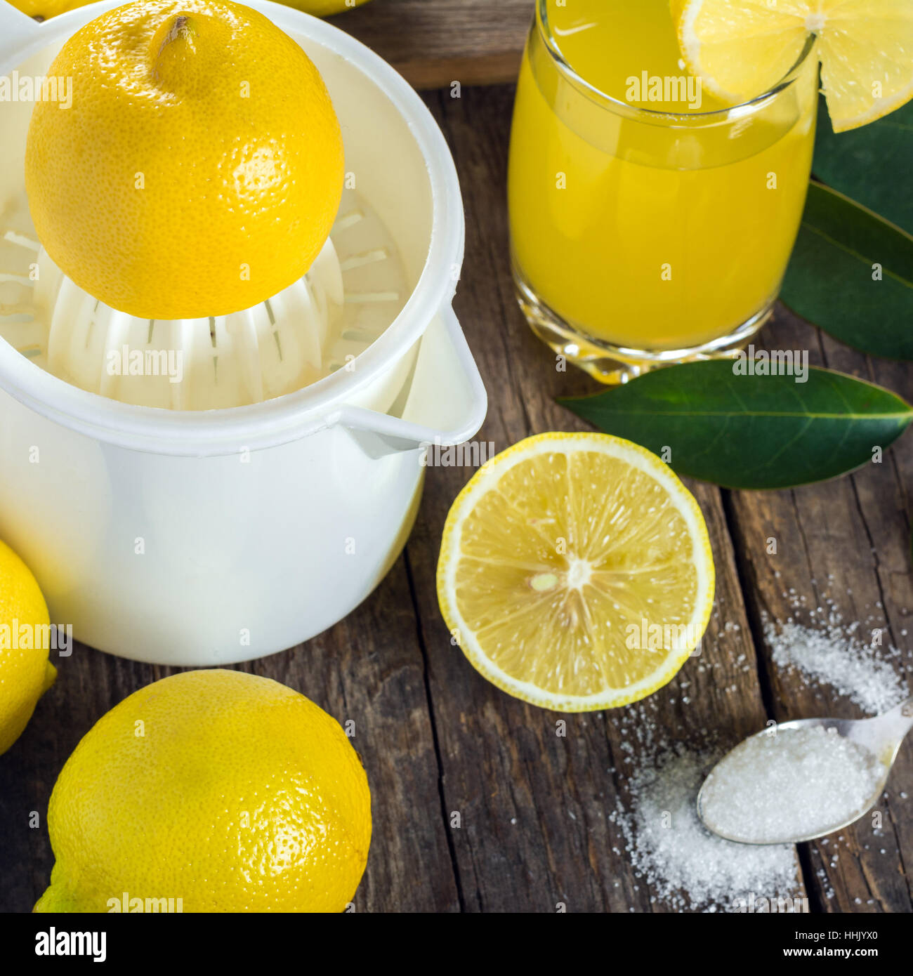 Squeezing lemon juice Stock Photo Alamy