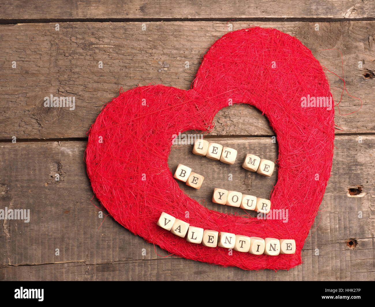 Valentines Day concept background with a red heart shape on wood Stock ...
