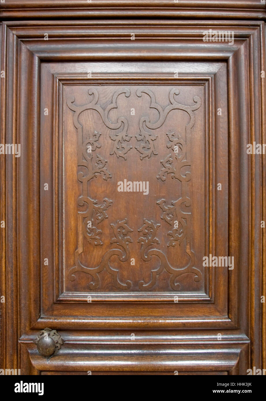 detail of a nostalgic wooden door with ornaments Stock Photo
