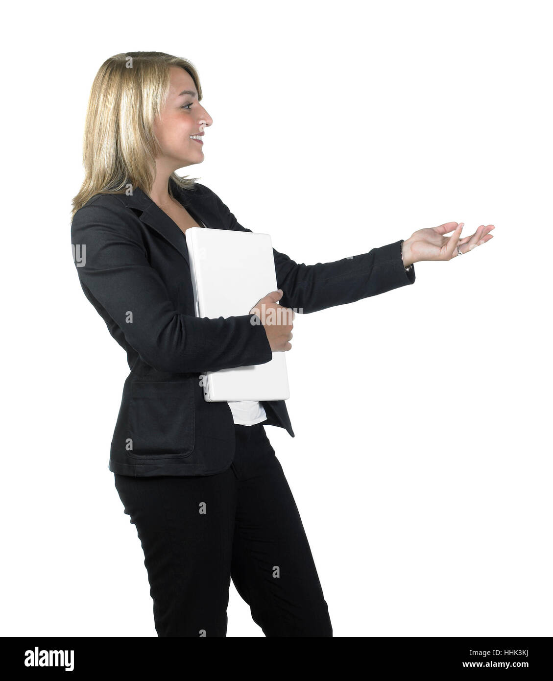 young gesturing blond business woman with laptop isolated on white Stock Photo