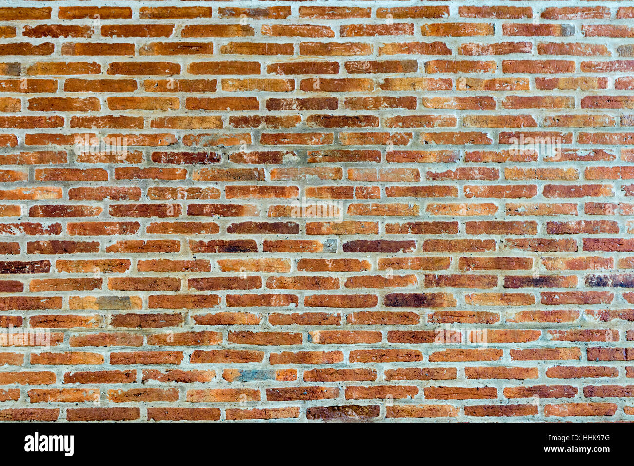 Background of orange brick wall pattern texture Stock Photo - Alamy