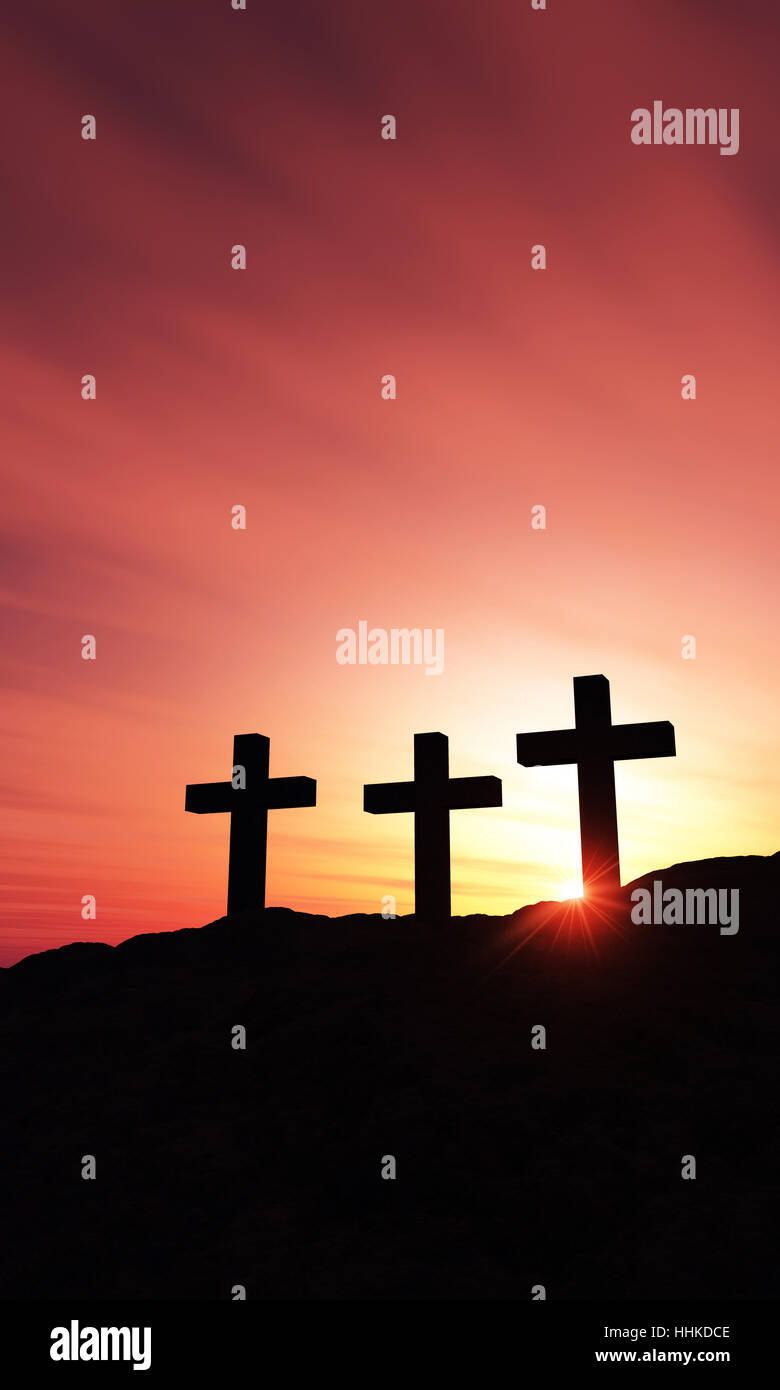 3 crosses on hill at sunset - vertical Stock Photo